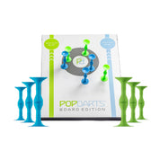 Pop Darts Board Edition with blue and green darts on a white background